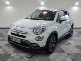 the white fiat suv is parked on a checkered floor