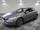 a grey volvo v40 wagon parked on a checkered floor