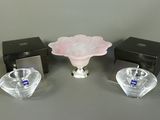 two small glass vases and a small glass bowl on a table