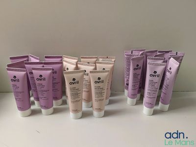 several tubes of skin care products are lined up on a table