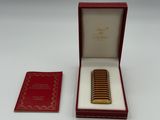 a red box with a gold plated ring inside of it