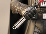 star wars figurine of darth vader holding a red light saber