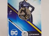 a close up of a card with a batman figure on it