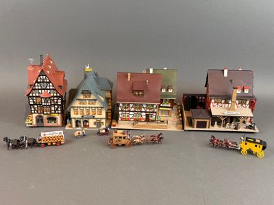 tout un tas de bâtiments miniatures posés sur une table