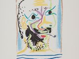 l'image d'un dessin d'un visage d'homme sur une feuille de papier