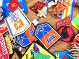 many different colored patches on a wooden table