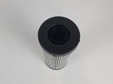a close up of a black and white filter on a white surface