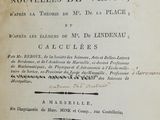un vieux livre écrit posé sur une table