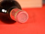 a bottle of wine that is sitting on a table