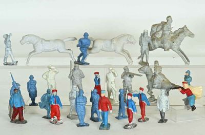 many figurines of soldiers and horses on a table