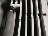 a black and white photo of a case with knives in it
