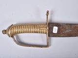 a picture of a very old looking knife on a white surface