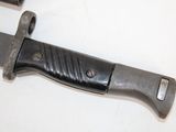 a knife that is laying on a table