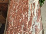 a table that has a marble top on it