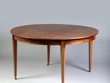 an image of a round table with a wooden top and legs