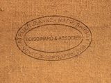 an image of a close up of a person ' s hand holding a brown bag