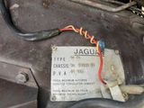 an image of a close up of a car engine with a tag attached to it