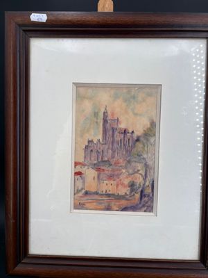 aquarelle encadrée représentant un château sur une colline, dans un cadre en bois