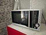 a microwave that is sitting on top of a counter