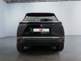 a picture of a black car parked in a garage