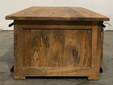 a wooden table with a drawer on top of it