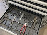 many tools in the drawer of a tool box
