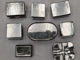 many different pieces of silver on a table