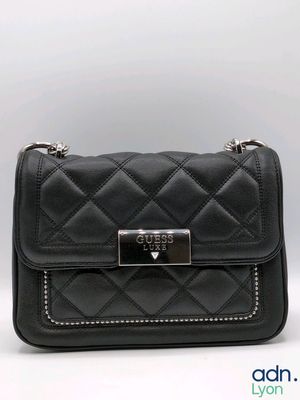 a black purse with a metal clasp on the front