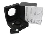 a black box with a watch inside of it