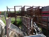 a horse that is standing in a fenced in area