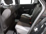 a car that has two seats in the back of it