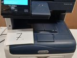 a printer that is sitting on top of a table