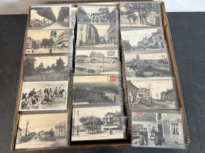 a box full of old black and white photos
