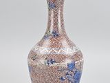 an image of a vase with a blue and white design on it