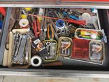 a drawer full of various tools and tools in it