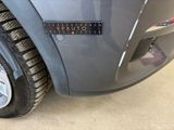 a close up of a car with a sticker on the side of it
