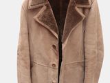 an image of a coat hanging on a hanger