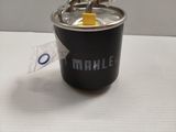 a small cup with a handle on a white table