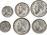 six types différents de pièces d'argent représentant des visages d'hommes et de femmes