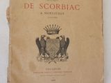 un vieux livre avec l'image d'un blason