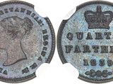 a close up of a coin with a crown on it