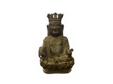 statue of a seated buddha with a crown on his head