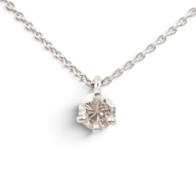 a diamond pendant on a silver chain on a white background