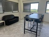 a living room with a couch and a table in it