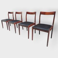 Suite de 4 chaises en bois foncé et skaï noir