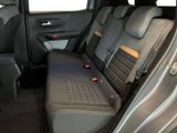 the back seats of a car with two rows of seats in it