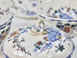 a close up of a plate with a lid on it