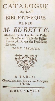 an old book with a black and white image of the title of a book