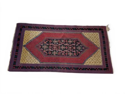 a close up of a rug on a white surface with a white background