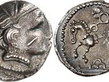 a silver coin with an image of a woman on it
